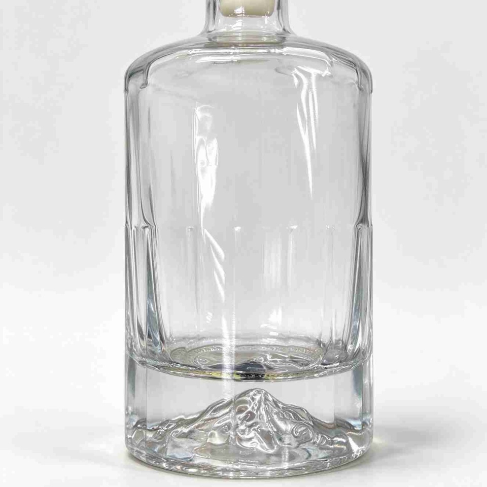 Vertical Cut Liquor Bottle with Mountain Embossed Base & Wooden-style Stopper, 750ml Premium Glass Bottle for Whiskey & Gin